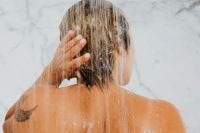 Lady washing her hair and body
