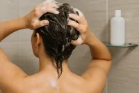 Lady washing her hair and body